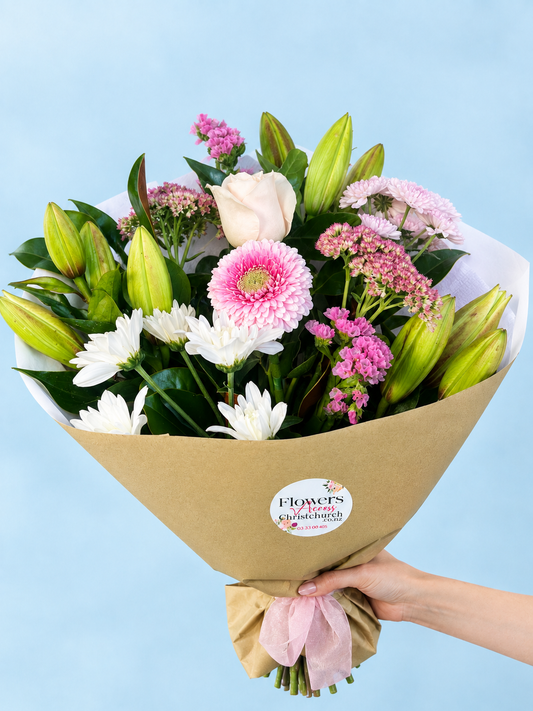 Pastel mix of seasonal flowers