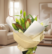 Bouquet of flowers wrapped in beige paper