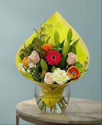 Bouquet of flowers in a yellow teardrop