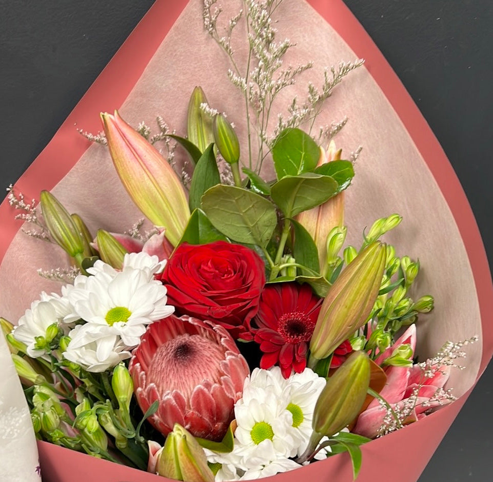 Pastel mix of seasonal flowers