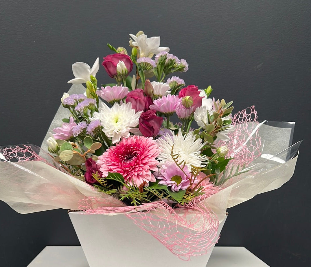 Flower arrangement in pot box