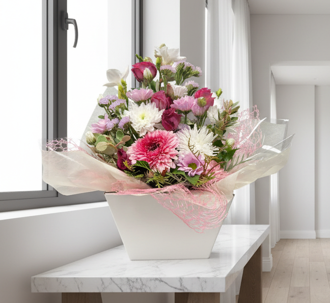 Bouquet of flowers in a white vase